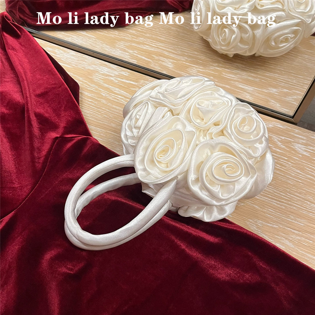 Bolso de mano retro floral con diseño oblicuo y hecho a mano en forma redonda - The Noble Style